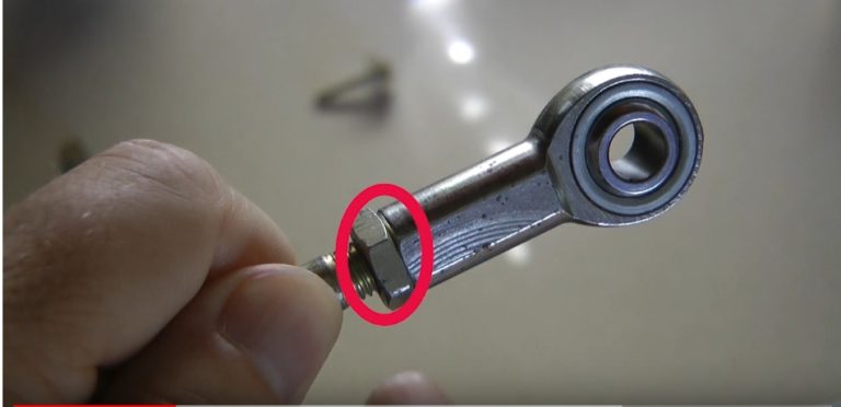 SYZ Jam Nut SYZ Rod Ends Jam nut securing a rod end in a linkage assembly