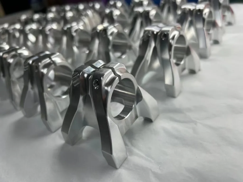 cnc machining products SYZ Rod Ends CNC Machined Parts Displayed