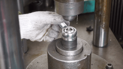 rodendtorqueadjustmentfactorypress SYZ Rod Ends Factory press machine adjusting rod end torque levels to F1, F2, and F3 by applying controlled pressure on the outer ring