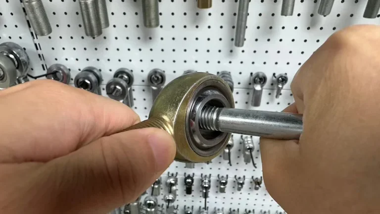 rodendtorquef1highresistance SYZ Rod Ends Demonstration of F1 torque rod end where a person uses a lever bar to rotate the ball due to very high resistance