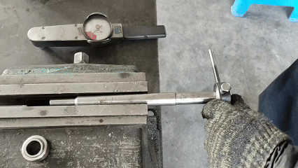 torquemeasurementengagegauge SYZ Rod Ends Engaging a dial torque gauge by sliding its hex socket onto the fixture’s hex head