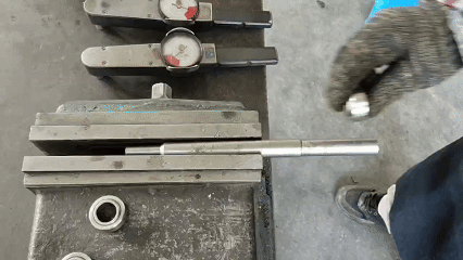 torquemeasurementsetupmountbearing SYZ Rod Ends Mounting a spherical bearing onto a steel rod fixed in a vise for torque measurement