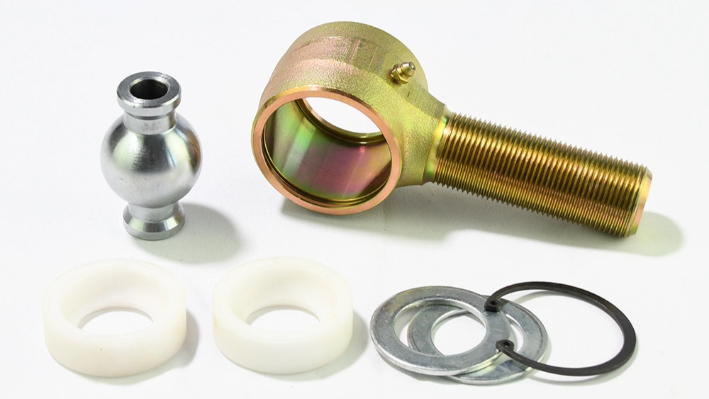 Johnny Joint rebuild kit: outer housing, ball joint, bushings, washers, snap ring.