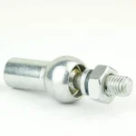 Metal fastener: a threaded bolt with a hex nut attached, resting on a white surface